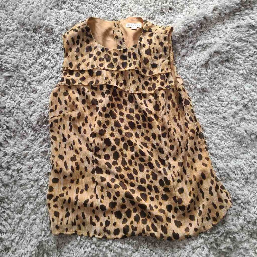Tailored ruffle leopard shell with zipper back